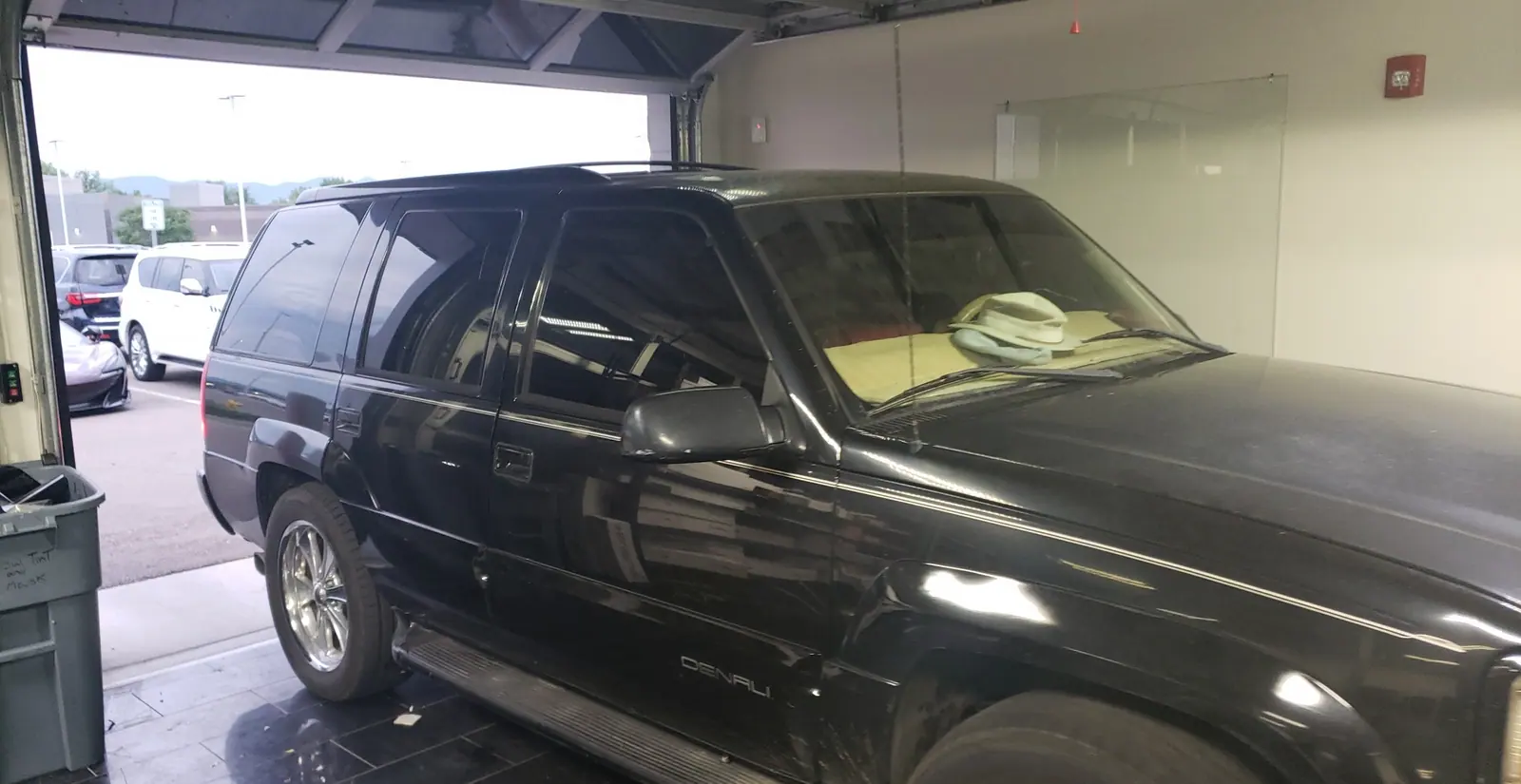 Black SUV with tinted side and quarter glass
