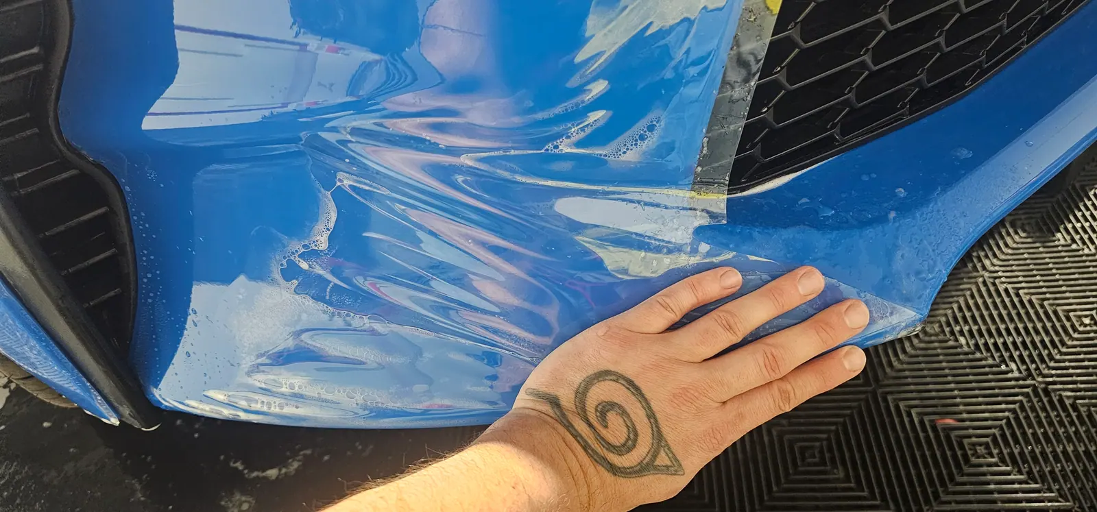 Protective film handled off the roll before install