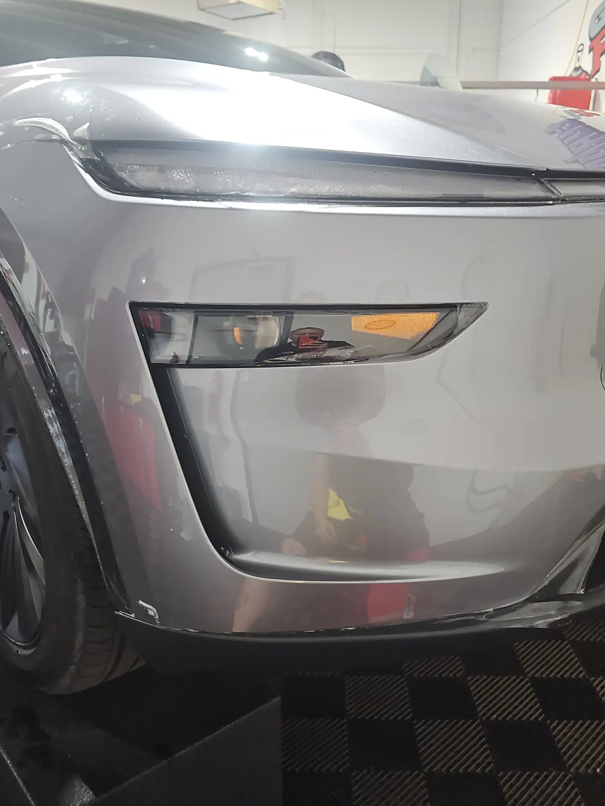 Tail lamp tinted on a silver SUV