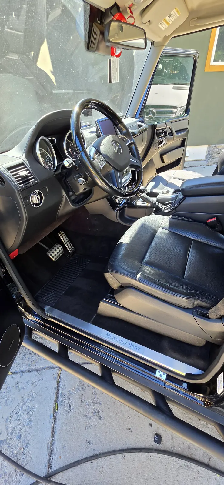 Cleaned front seat and steering wheel after an interior detail