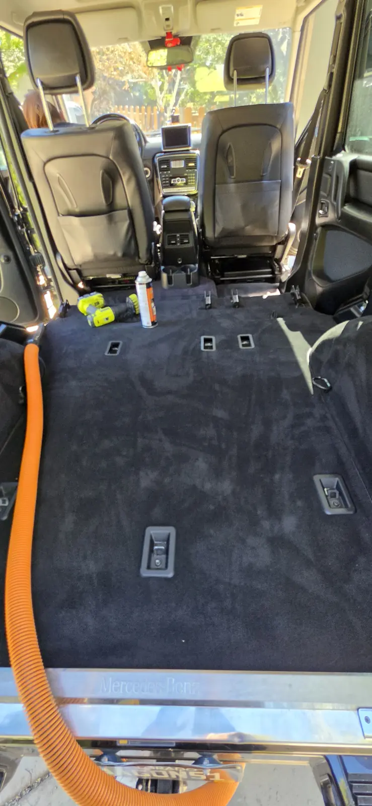 Extracting dog hair and dirt out of a Mercedes G-Class carpet